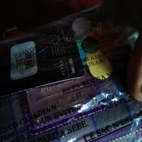 Loungefly Pink and Purple Backpack with Floral Accents - Picture 12 of 13